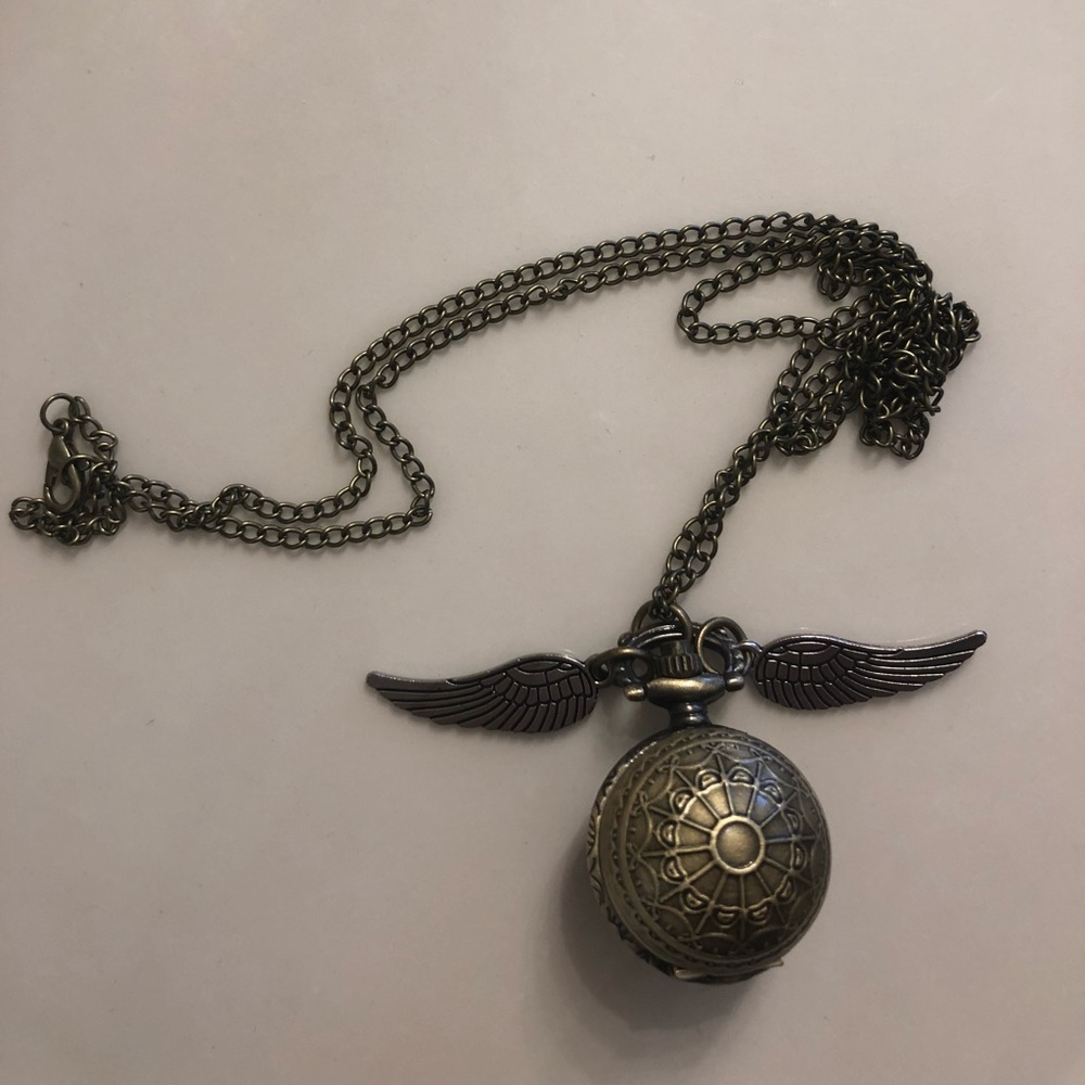 Harry Potter watch snitch gold tone & silver tone